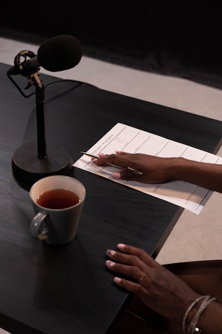 Professional interview setting with microphones and speakers
